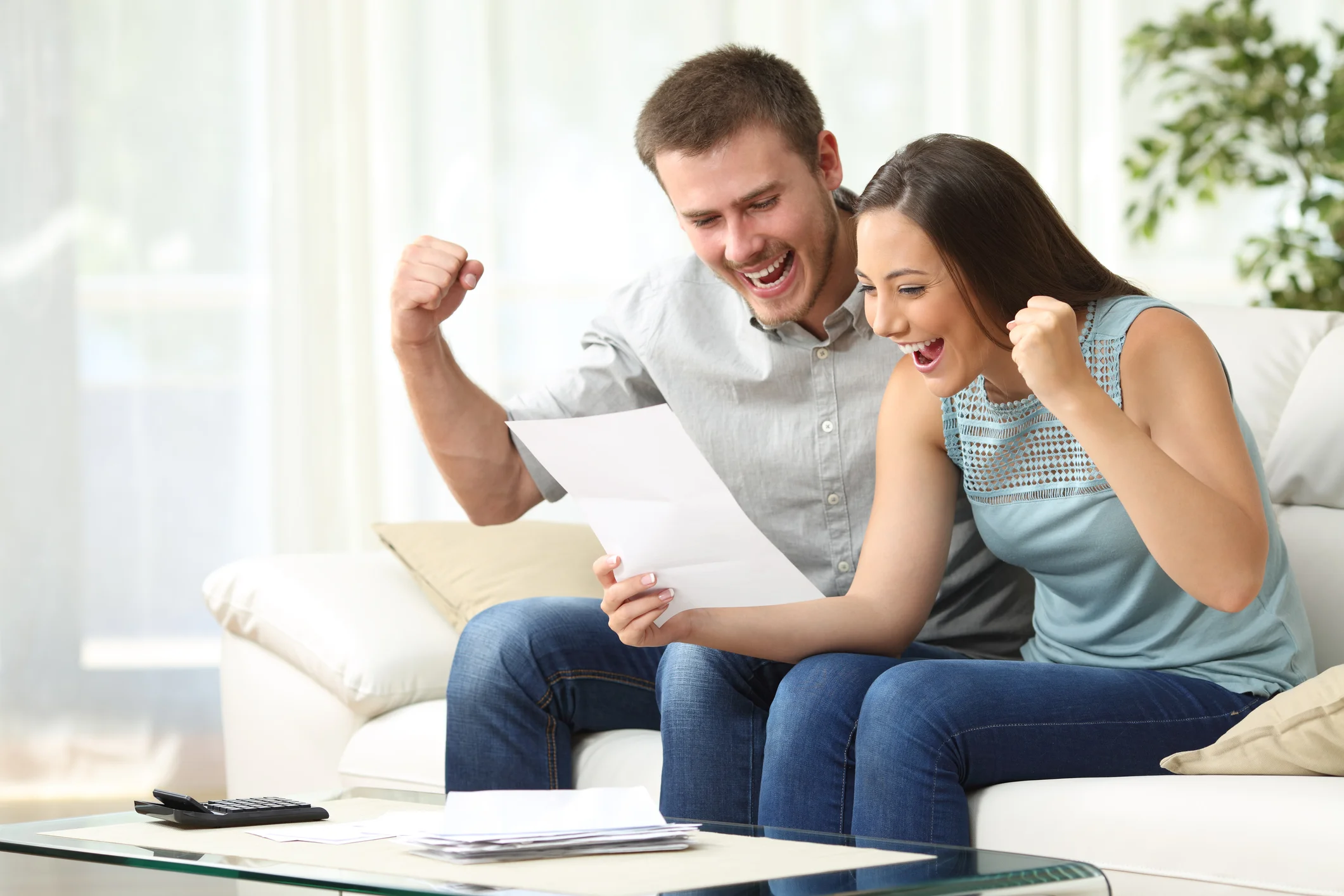 Couple reviewing a mail offer together